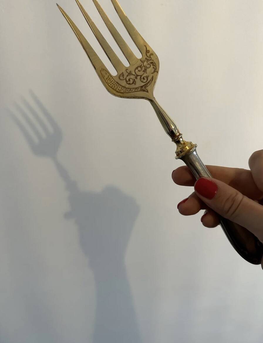 Engraved meat fork in silver and gold metal