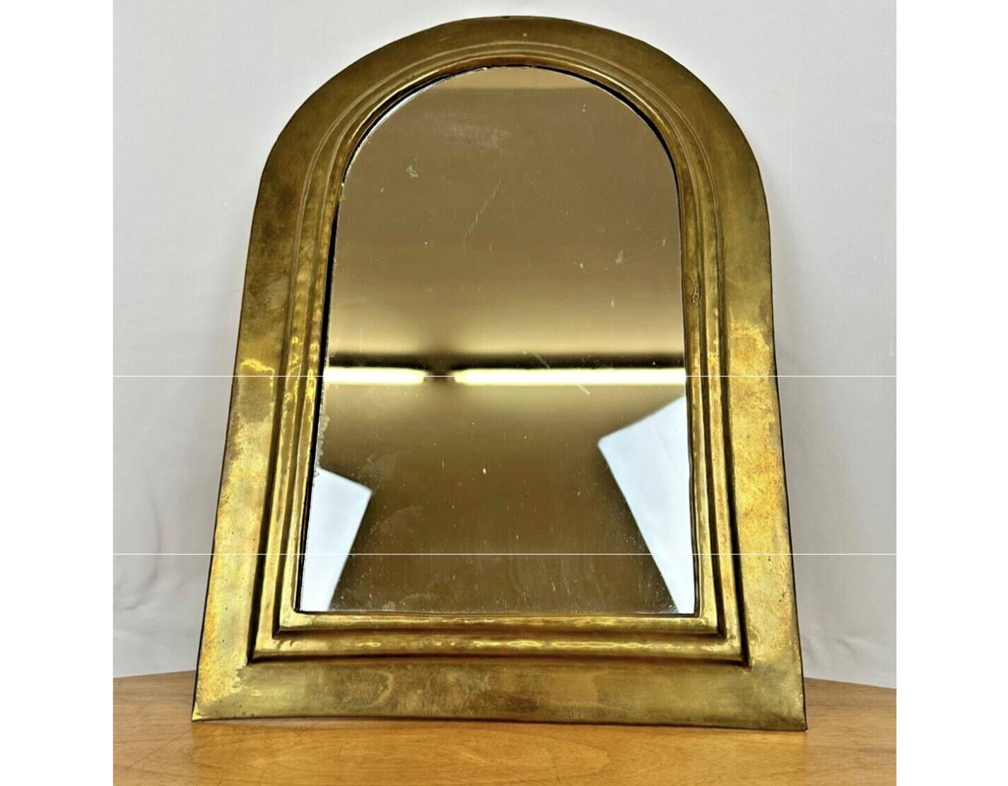 Vintage golden half-moon mirror