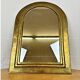 Vintage golden half-moon mirror