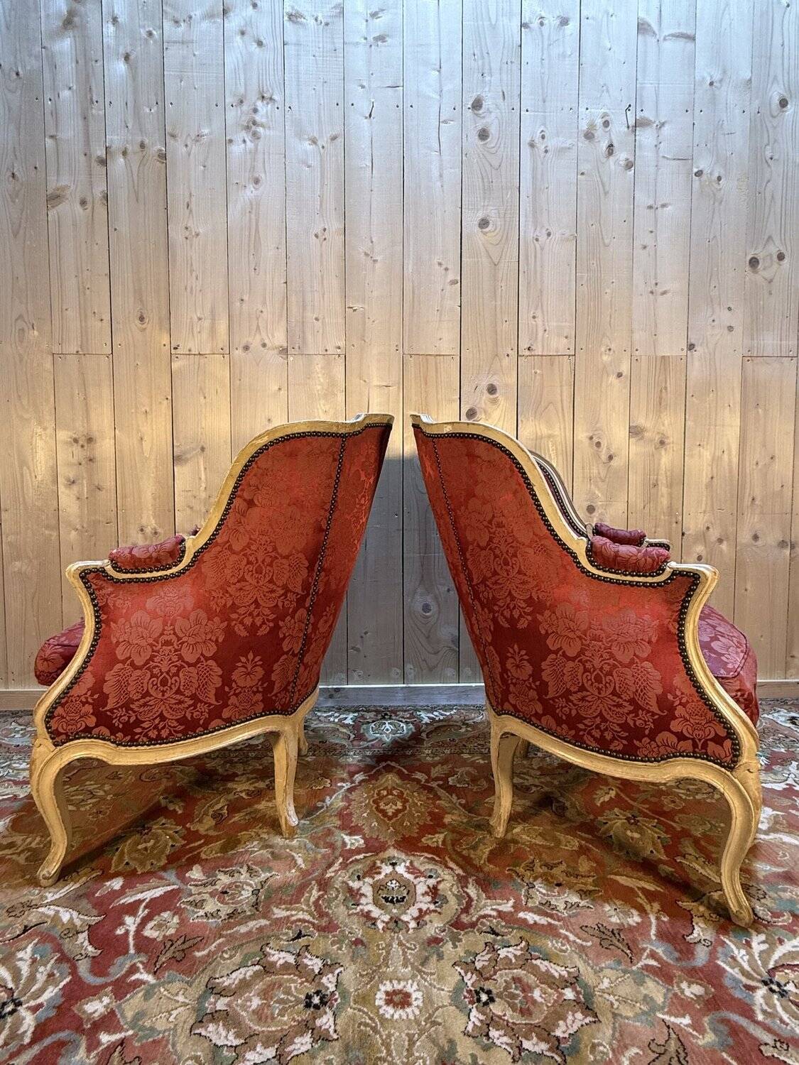 Pair of gondola armchairs in Louis XV style with highlighted wood.