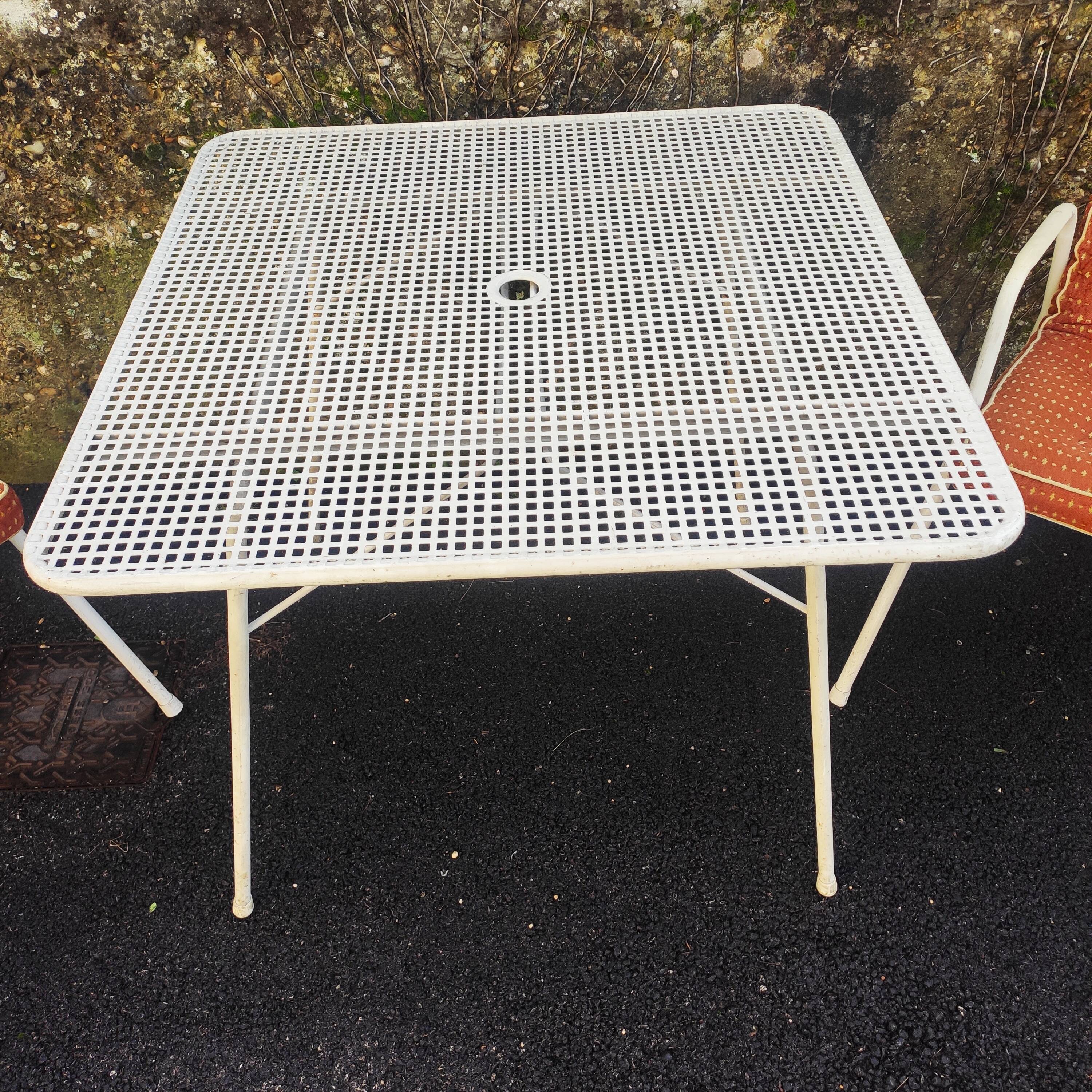 Armchairs with original cushions and Emu garden table model Rio 1966.