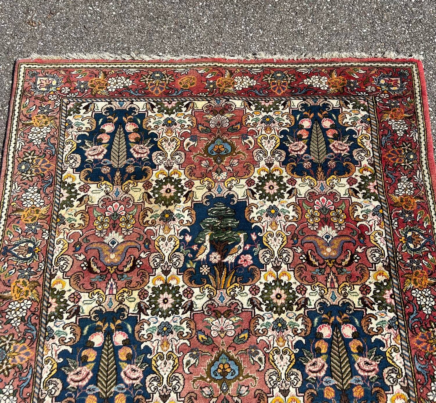 oriental rug with bird decoration 150/205cm