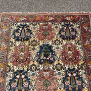 tapis d'orient à décor d'oiseaux 150/205cm