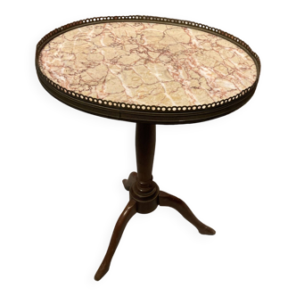 Wooden pedestal table with marble top