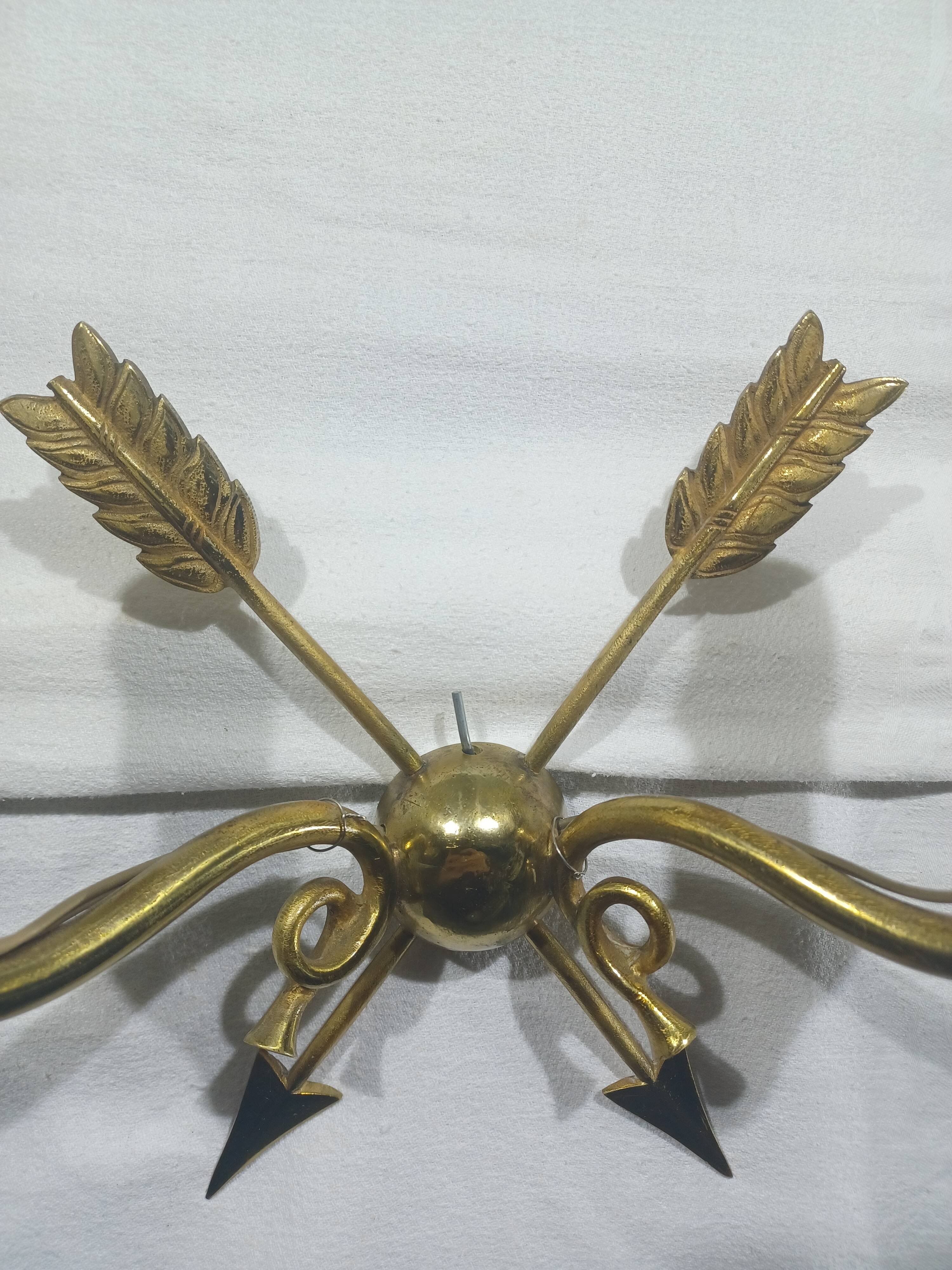 Empire style arrow wall light