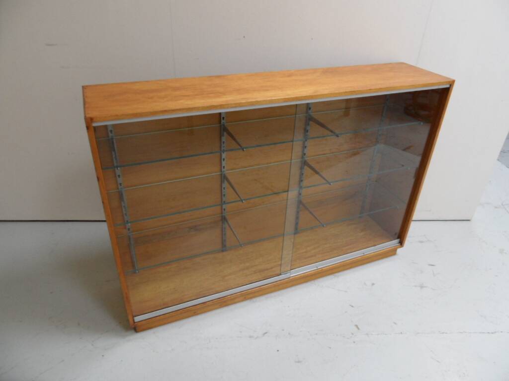 Vintage shop display cabinet with sliding doors