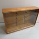 Vintage shop display cabinet with sliding doors