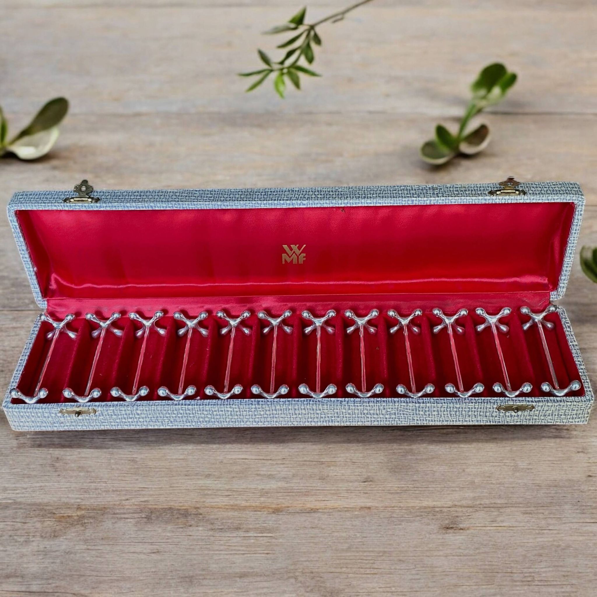 12 WMF silver-plated knife holders, boules model, in a box
