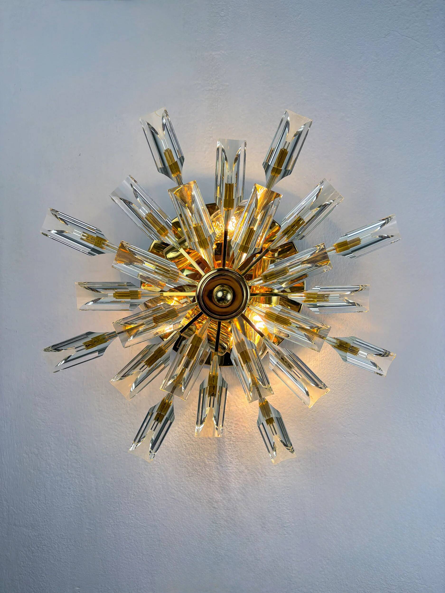 Sun-shaped ceiling or wall light by Oscar Torlasco for StilKronen, cut Murano glass, Italy, 1970s