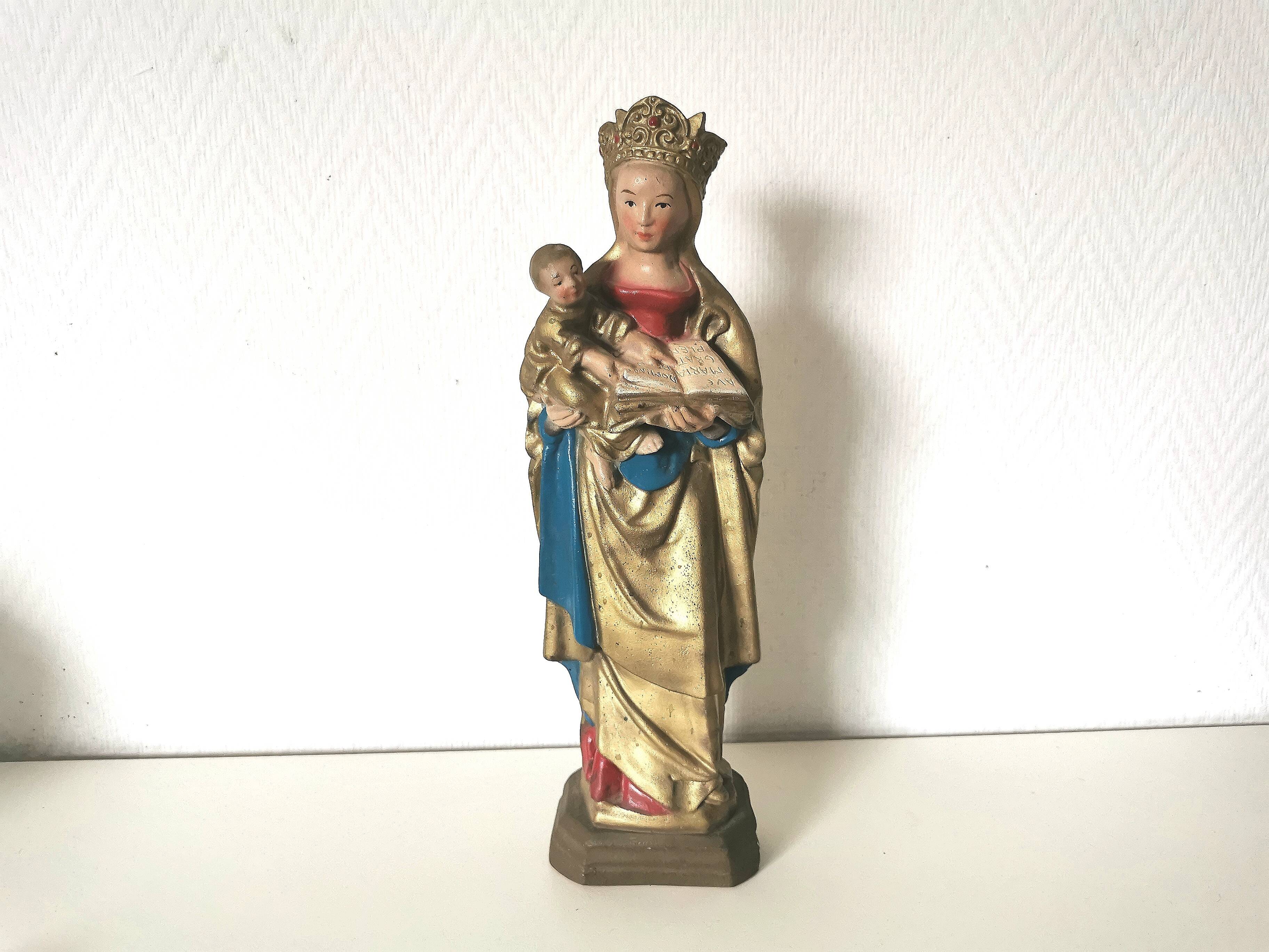 large statue of the Virgin and Child in painted plaster