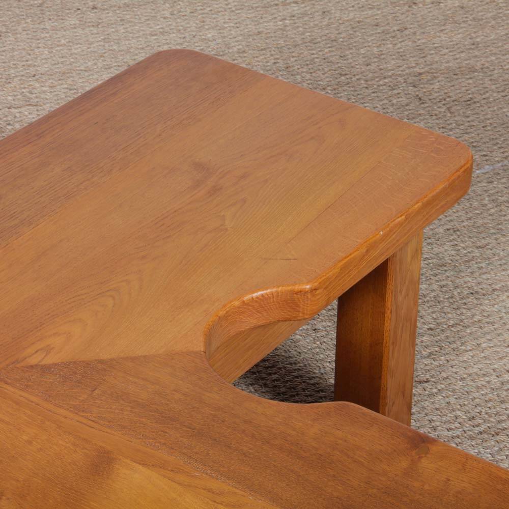 Solid oak coffee table in the style of Seltz, 1980.