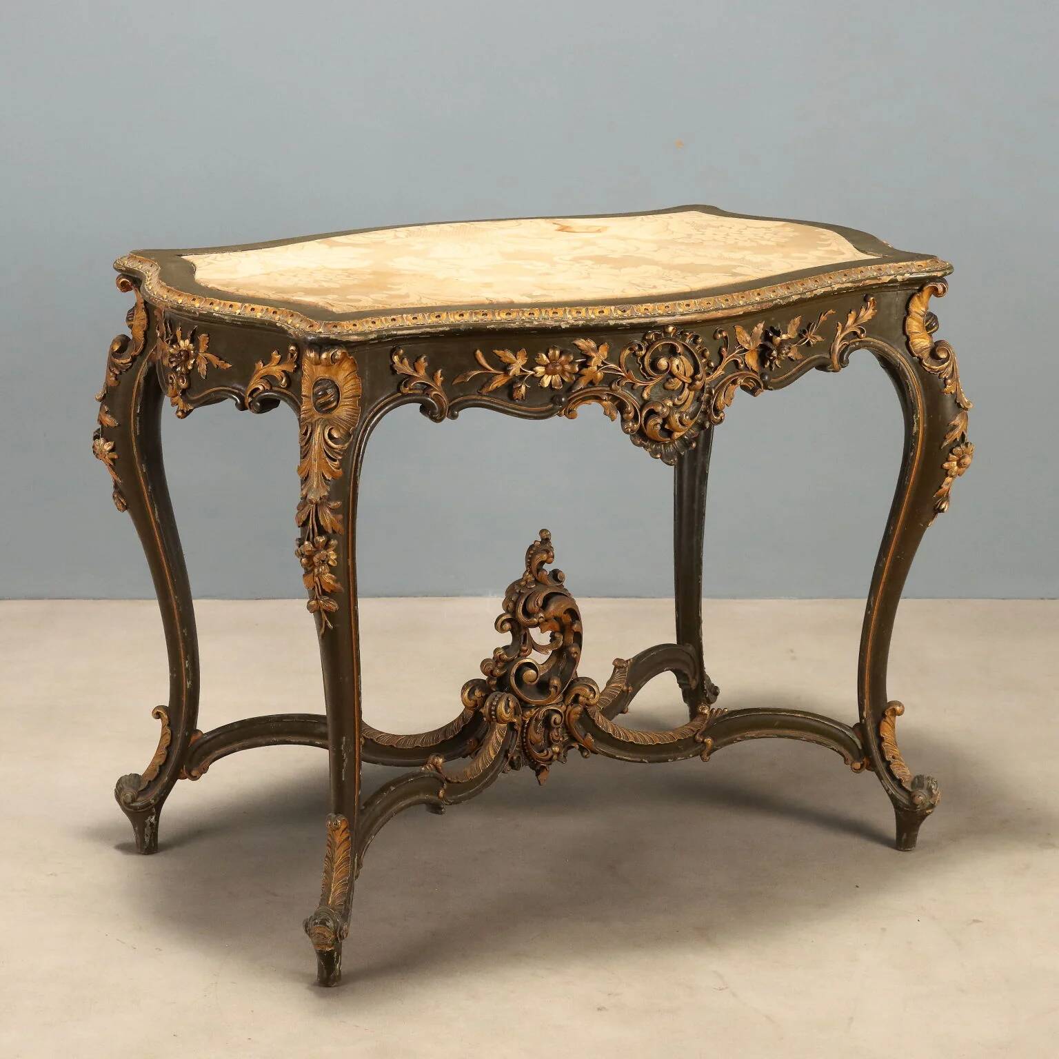 Baroque-style table in carved wood