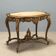 Baroque-style table in carved wood