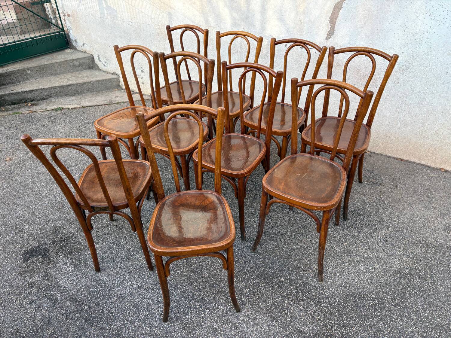 10 varnished patterned bistro chairs