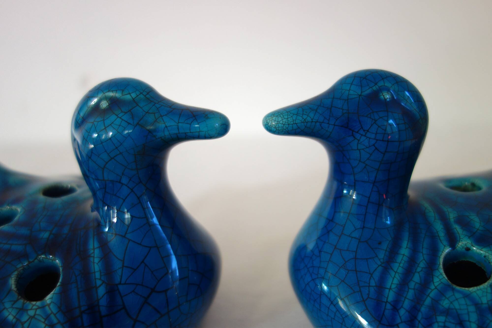 2 blue ceramic duck flower picks