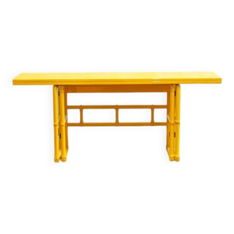 Yellow lacquered console with a flip-top surface by McGuire San Francisco, 1970s.