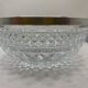 Chiseled glass (crystal?) salad bowl with silver metal edge