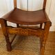Lot de 4 chaises anciennes en bois et cuir