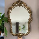 Rocaille style mirror from the 20th century in wood and gilded stucco, Putto on the pediment