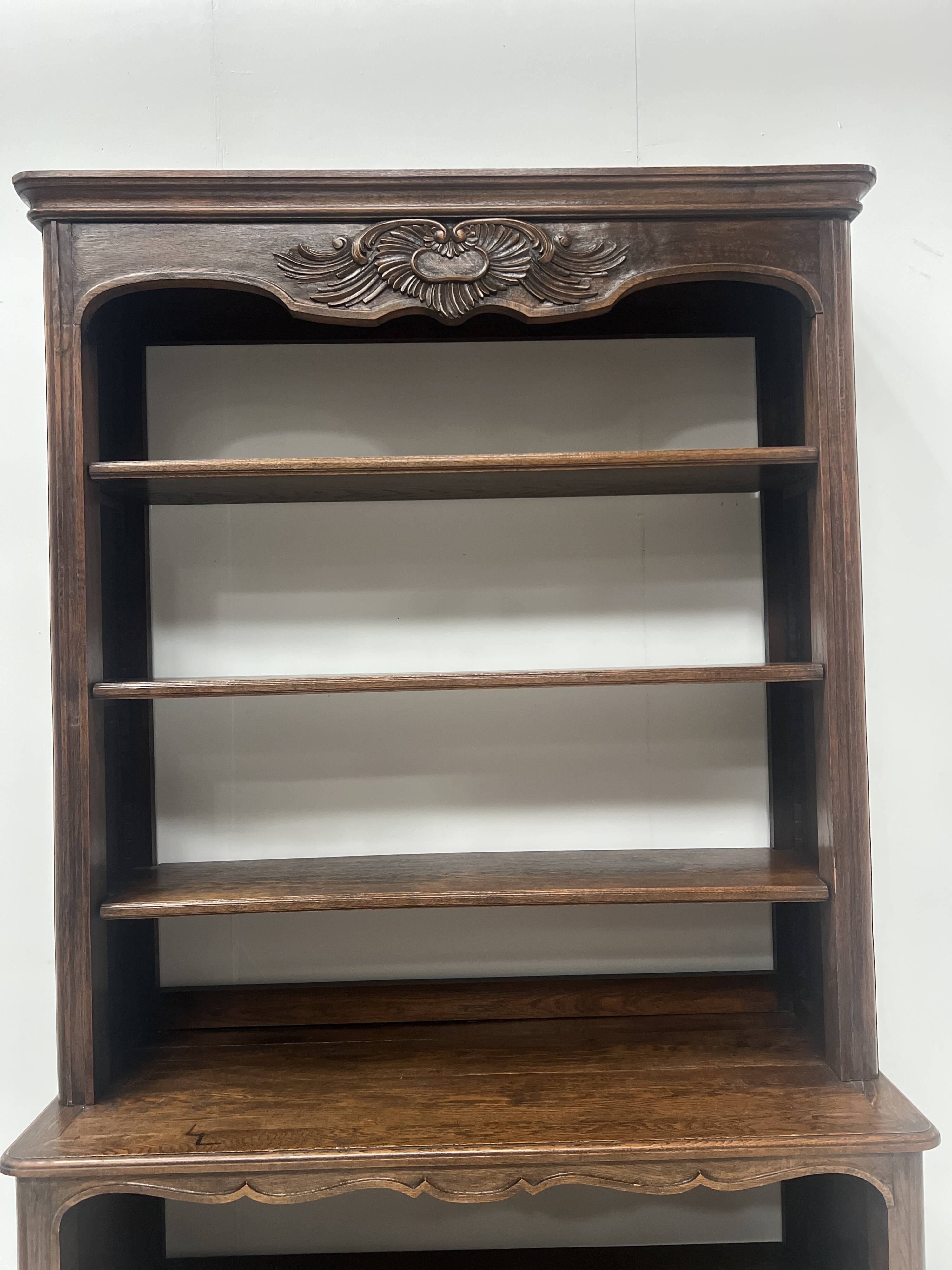 Wall library in two sections in Louis XV style made of solid oak, 20th century.