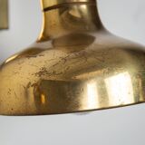 Set of three brass adjustable wall lamps