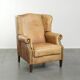 Cow leather wingback armchair with a beautiful timeless English look