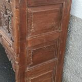 Old wooden console with chains