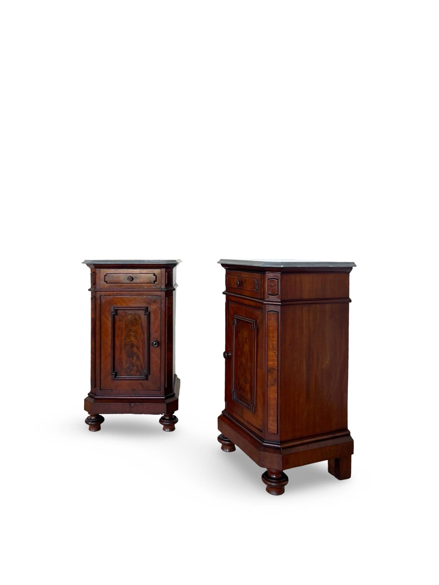 A pair of antique walnut bedside tables from the 1890s.