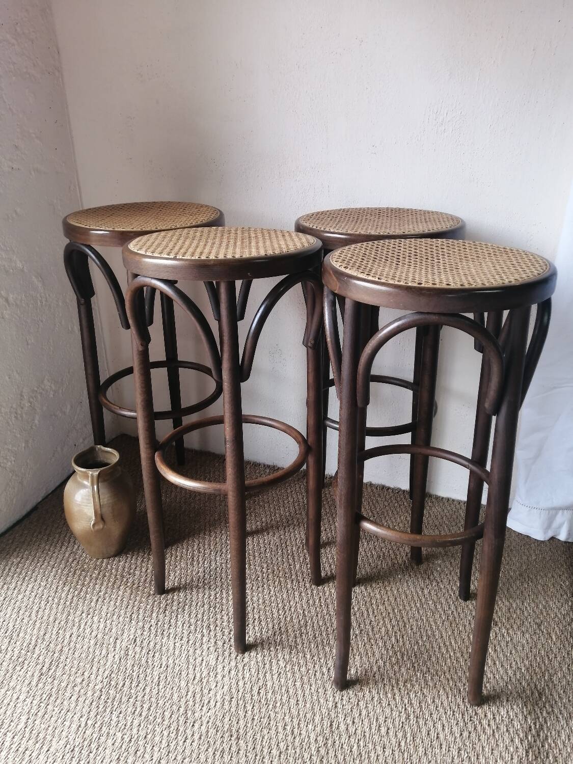 Set of 4 high bistro stools in curved wood and canework.