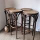 Set of 4 high bistro stools in curved wood and canework.