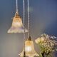 Vintage triple tulip pendant light in chiseled glass and holophane