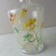 Old enamelled decanter, flower decoration, Legras