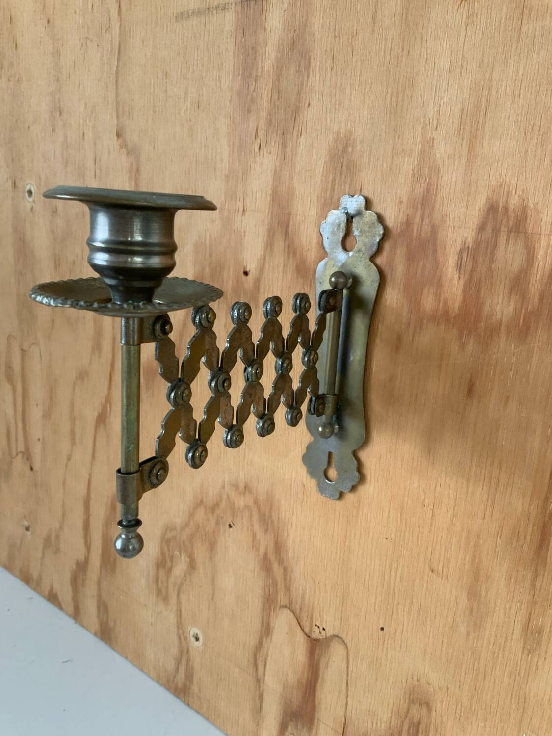 Old accordion candle holder