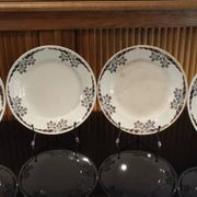 4 assiettes plates en terre de fer modèle OKAN de Longchamp