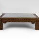 Solid oak coffee table carved with fauns and gray marble top, France, circa 1940