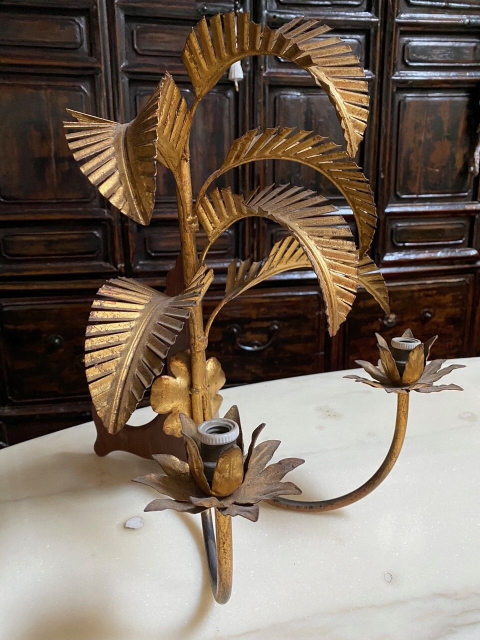 Pair of vintage golden palm leaf sconces