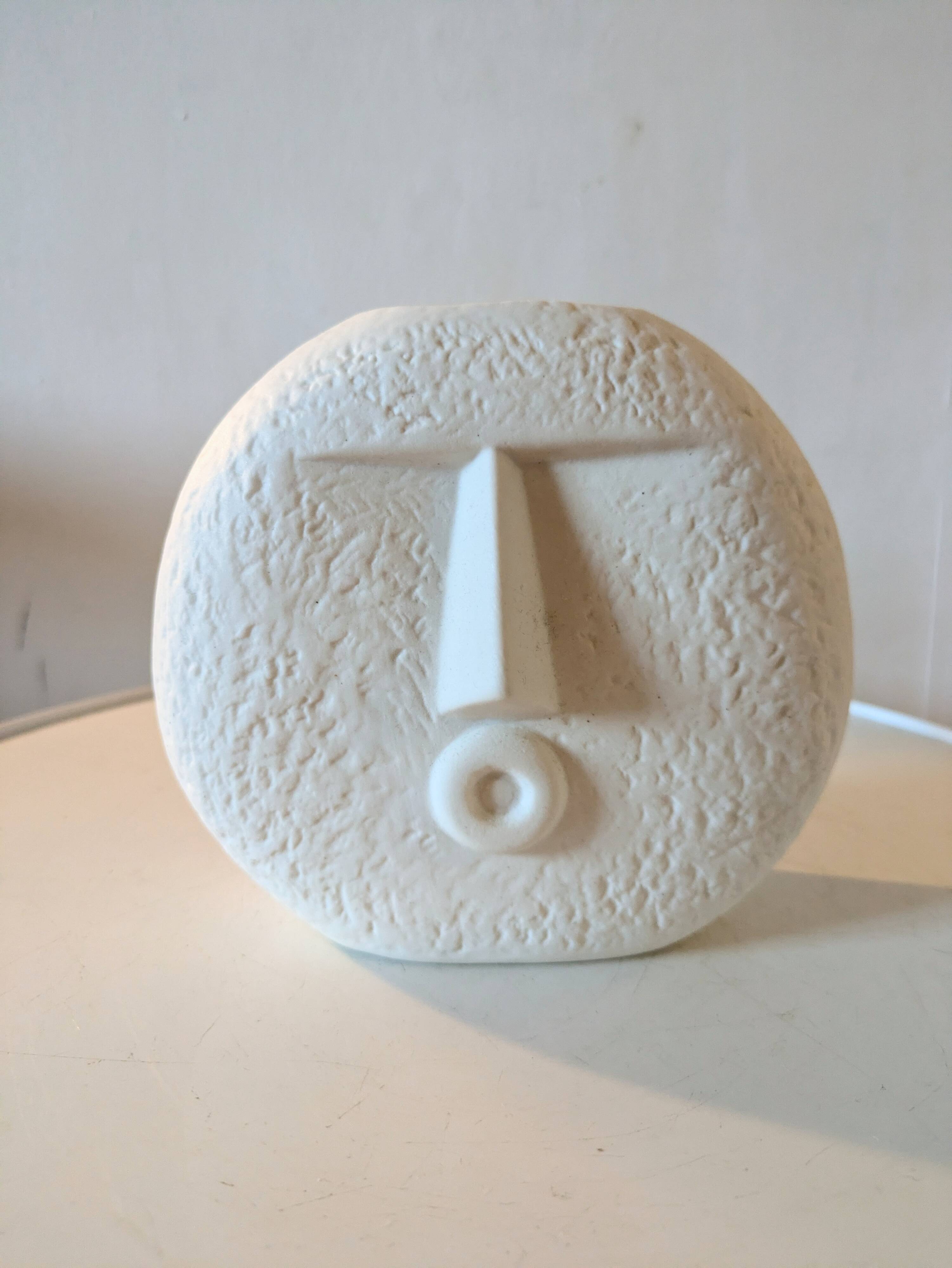 Stylized face biscuit vase