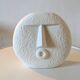 Stylized face biscuit vase