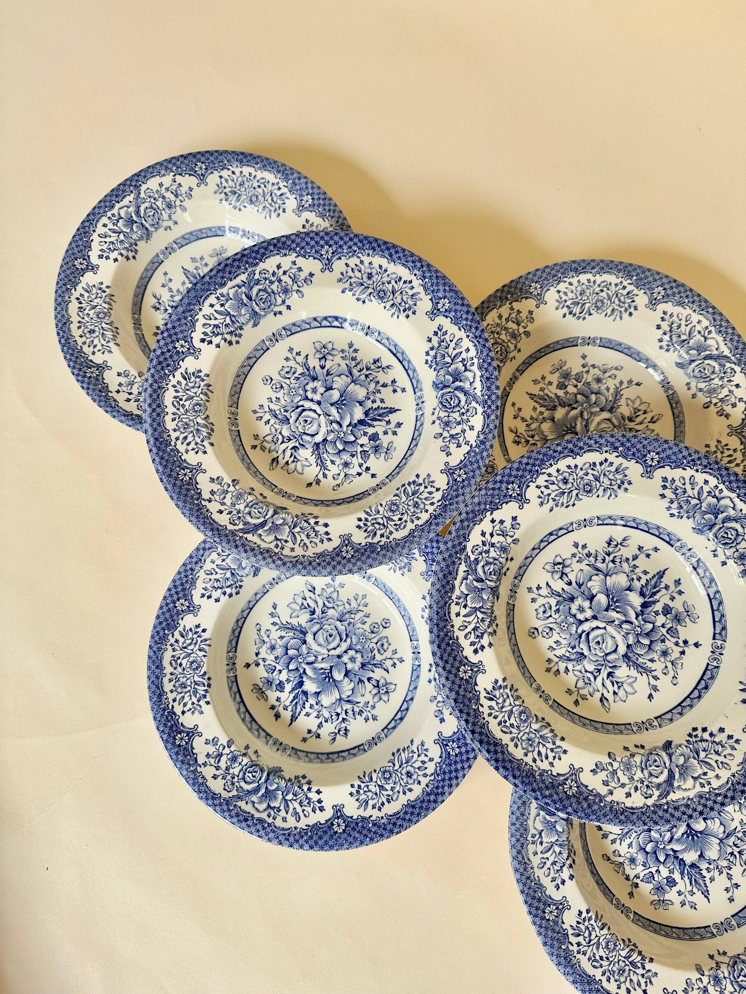 Set of six English deep plates, made of ironstone ceramic, floral patterns.