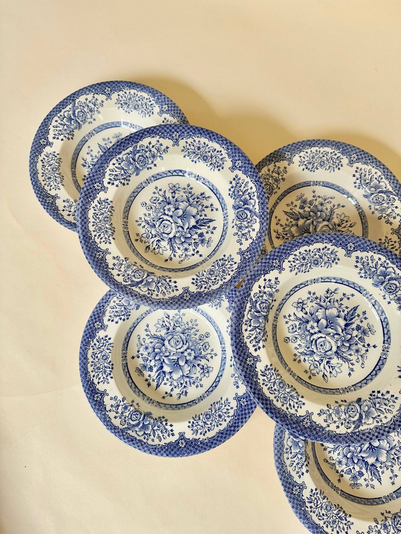 Set of six English deep plates, made of ironstone ceramic, floral patterns.