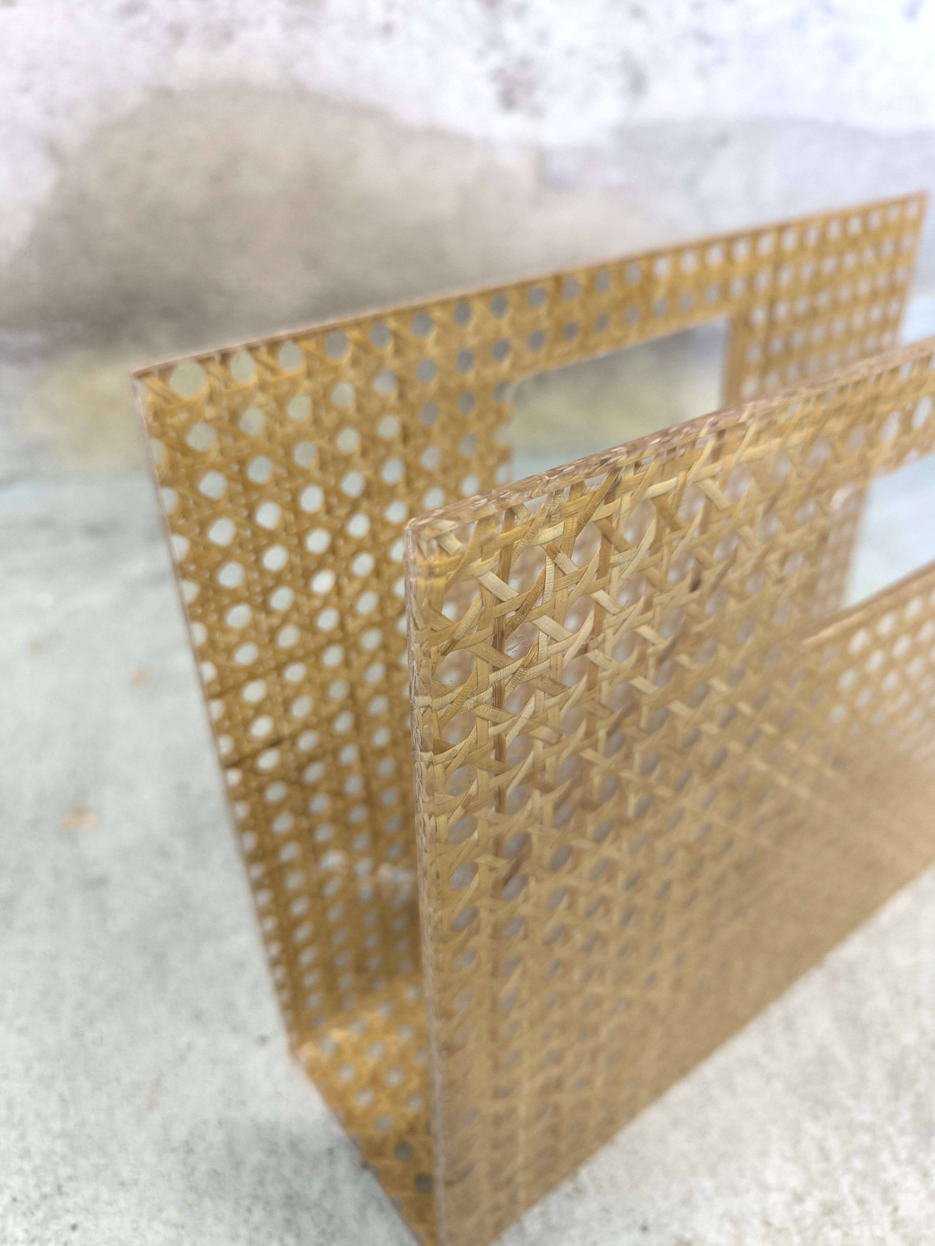 Vintage magazine rack in plexiglass and cane.