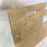 Vintage magazine rack in plexiglass and cane.