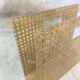 Vintage magazine rack in plexiglass and cane.