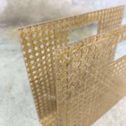 Porte-revues vintage en plexiglas et cannage