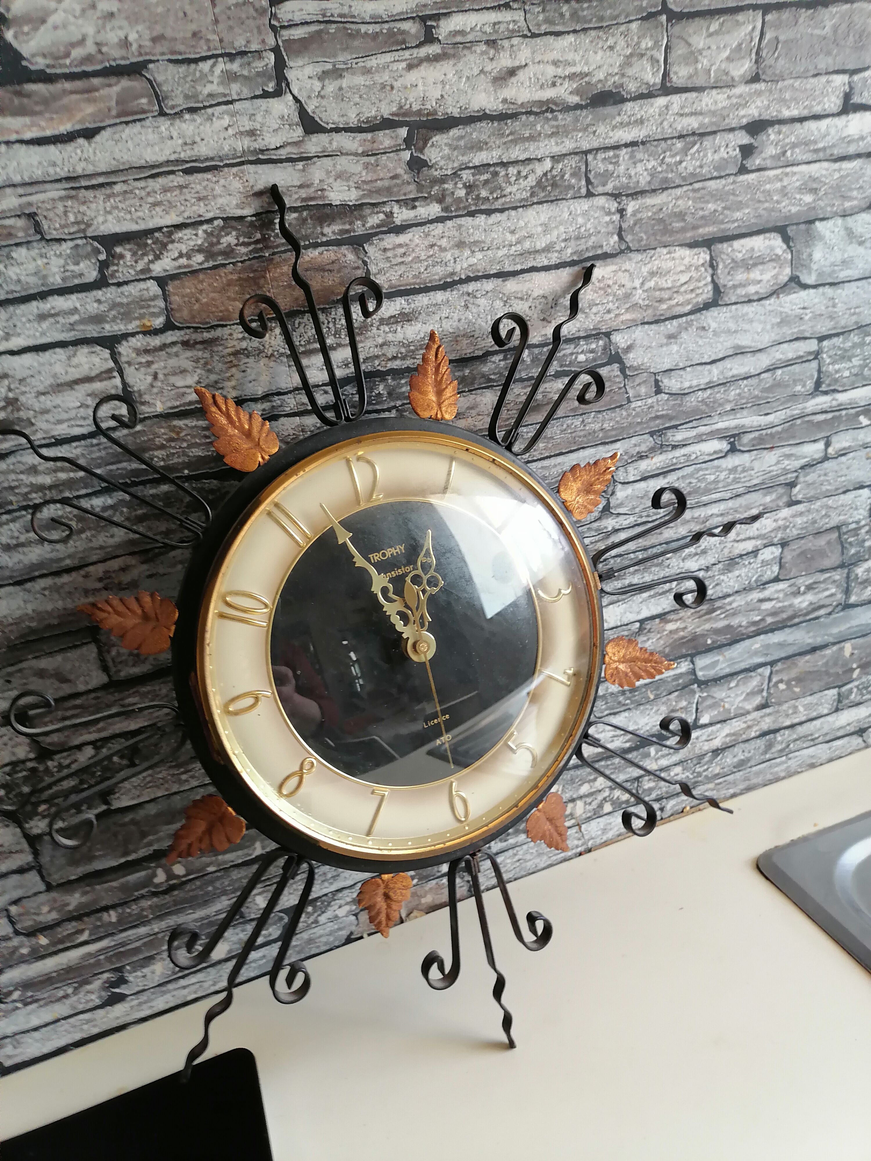 Wrought iron trophy wall hanging in office 1960