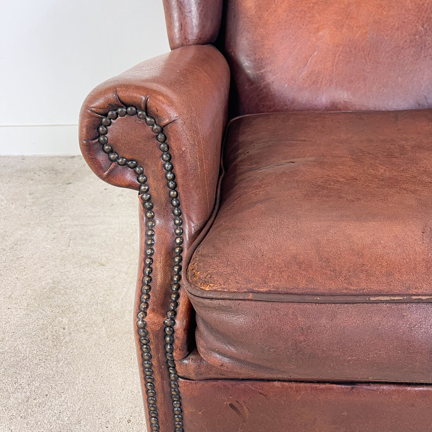Vintage sheep leather wingback armchair, Druten