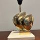 Brass lamp in the shape of a fish by Somchai Hattakitkosol.