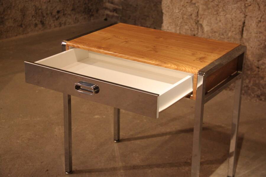 Small dressing table with chrome legs and oak laminate.