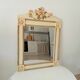 Vintage bohemian mirror from the 80s in carved wood.