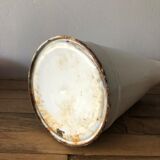 Old pitcher in enamelled sheet metal